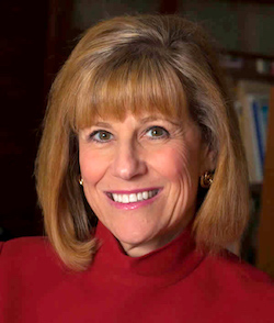 Image of Nancy Brodovsky in a red suit